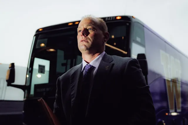Washington football coach photographed on the sideline